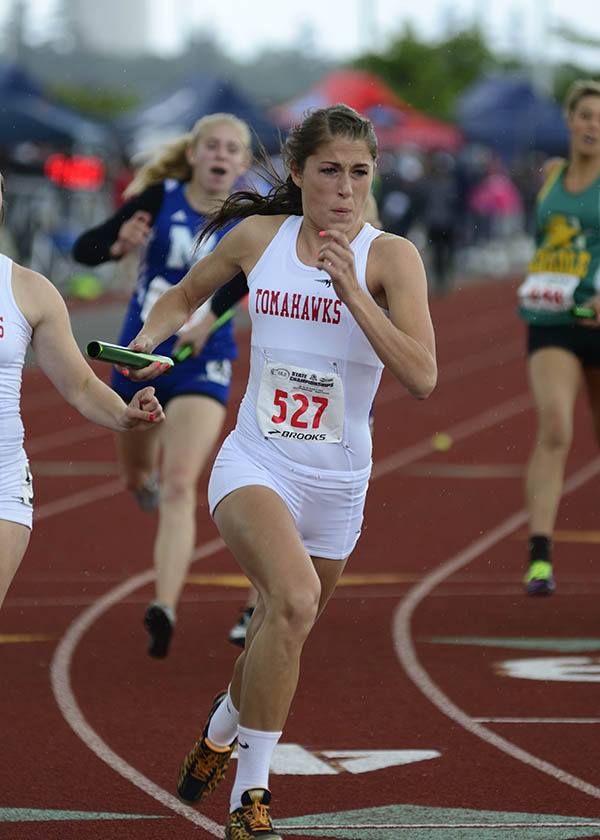 Marysville-Pilchuck's Mackenzie Nolte takes off for her leg of the the girls' 4x100-meter relay at the WIAA State Track and Field Championships. Her team finished in sixth place with a time of 49.44.