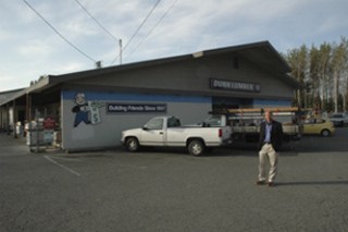 Dunn Lumber President Michael E. Dunn stands in front of the Marysville Dunn Lumber store's current storefront