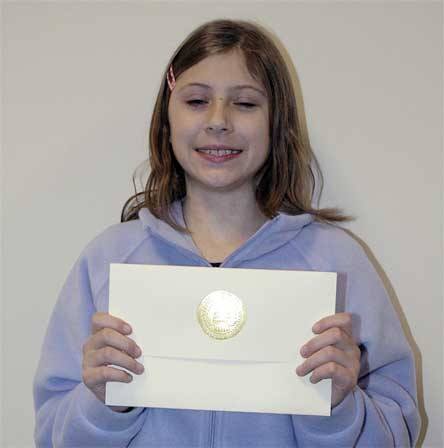 Marysville Middle School seventh-grader Jessica Red Elk proudly displays her invite to the National Young Leaders State Conference in Seattle Feb. 4-7.