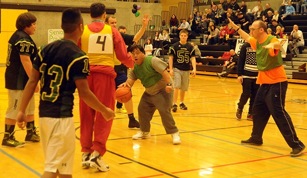 A halftime basketball game played by adults with special needs and the football team was a lot of fun for all involved.