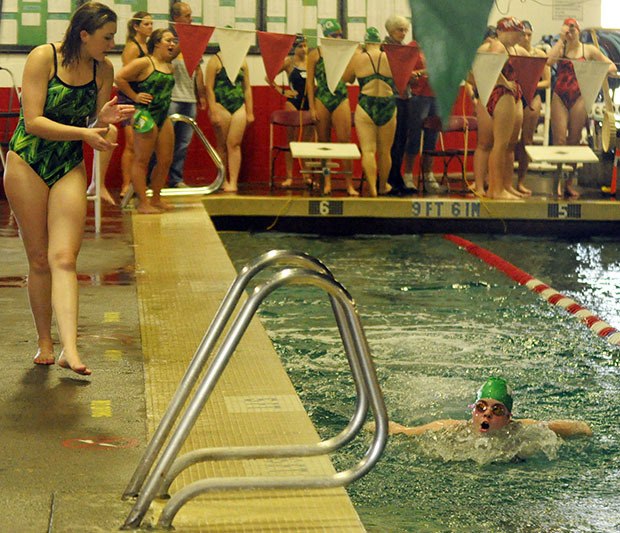 Brooke Wherley of Marysville Getchell cheers on  teammate during the swim meet against Mount Vernon.