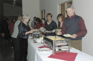 The Fultons lead the line to dish up at the Marysville Community Food Bank for its Dec. 16 fundraising dinner.