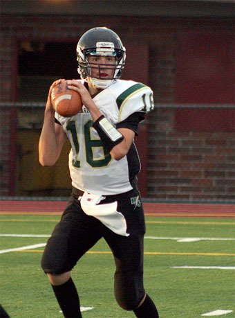 Marysville Getchell quarterback Dylan Diedrich looks downfield for an open receiver during the Chargers' 40-0 loss to Lindbergh Sept. 1.