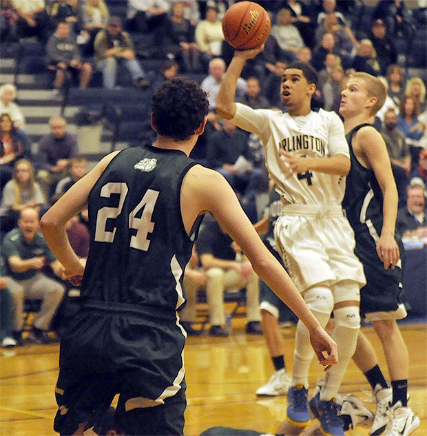 Arlington's Donovan Sellgren with the jump shot against Mount Vernon Dec. 2.