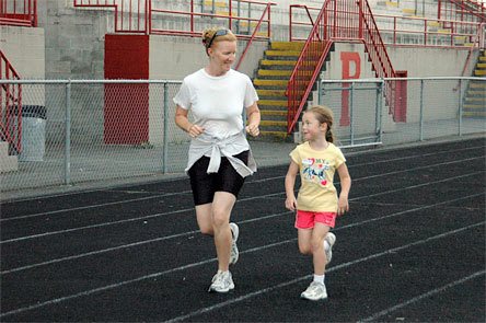 Six-year-old Zinead Morales runs the 1