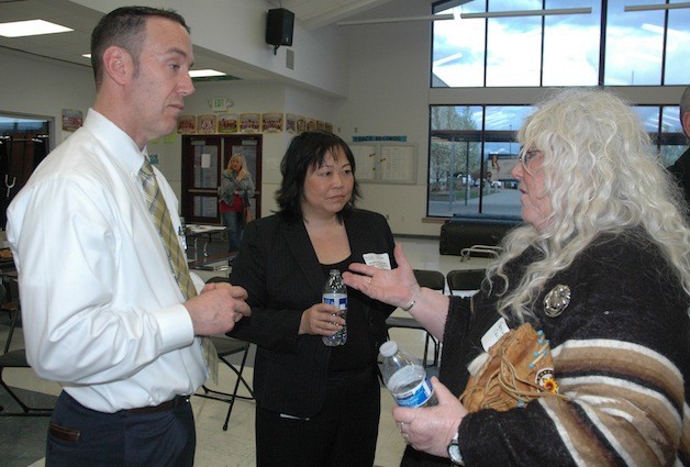 Marysville Public Works Director Kevin Nielsen and Chief Administrative Officer Gloria Hirashima speak with Nancy Nolf.