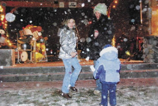 Families enjoyed dancing in the snow at last year’s Merrysville for the Holidays. City officials aren’t guaranteeing another round of snow