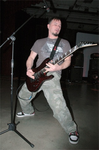 Kill Closet founding member Chuck Macaw rocks out on the guitar during the six-member metal band’s performance in the Marysville-Pilchuck High School auditorium March 21.