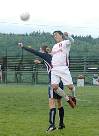 M-P junior Terence Johnson fights for the ball in the air.