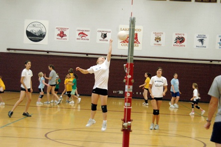 Lining up at setter as older campers knock the ball back and forth