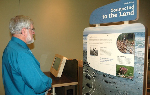 Tim McLaughlin looks at a Tulalip exhibit.