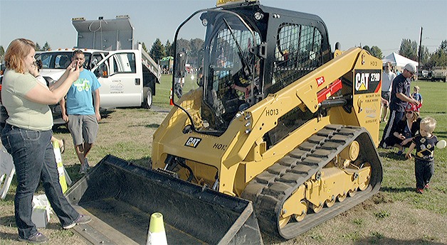 Kids of all ages enjoy getting into the big rigs at Marysville's annual Touch a Truck event at Asbery Field.