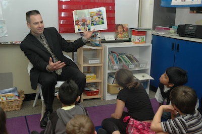 Marysville Mayor Jon Nehring reads to Mina Shelly's second-graders at Liberty Elementary from the picture-book 'Rock