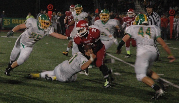 M-P's Killian Page runs through the Bishop Blanchet defense during the Tomahawk's 48-21 victory on Nov. 9.