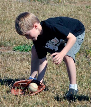 Jacob Turner practices catching ground balls at he Marysville Parks and Recreation Mini Ultimate Sports Camp on Wednesday