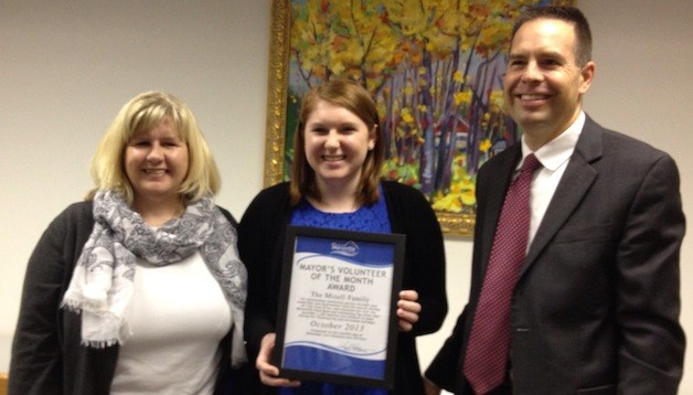 Tara and Peyton Mizell receive city of Marysville Volunteer of the Month awards from Marysville Mayor Nehring.