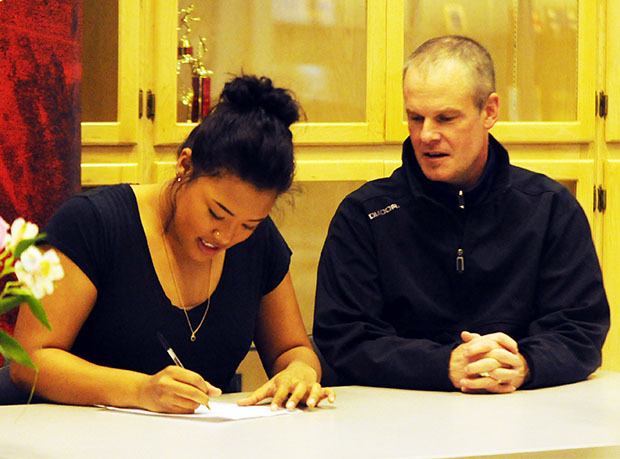 Marysville Getchell's Taylor Cannal signs her intent to play soccer for Trinity Lutheran as her new coach