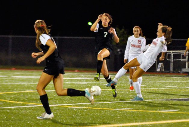 Tomahawks’ midfielders attempt to sweep the ball from Archbishop Murphy in the Thursday