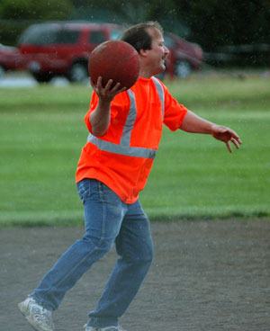 Marysville resident Bryan Huschka of Team Green goes to throw out a baserunner.