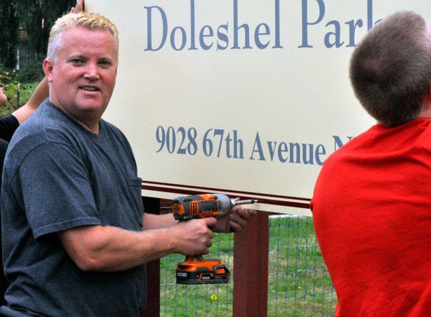 Mike Carr posts the sign for Doleshel Park