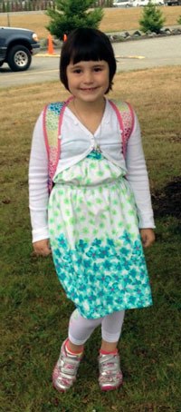 Adina Paquette is ready for her first day in the first-grade at Marysville Cooperate Education Program housed at Marshall Elementary School.