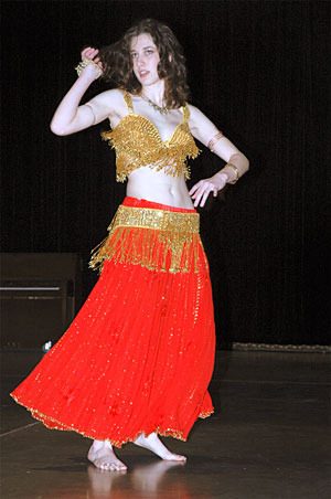 Christina Lee shimmies through a belly-dancing routine.