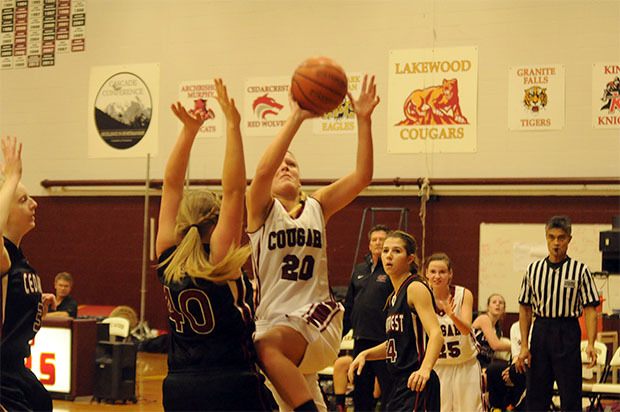 Lakewood's Marissa Blair puts an inside shot against Cedarcrest in the Cougar.