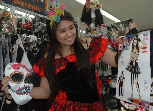 Maria Kissell shows off a Mexican Day of the Dead-themed ensemble at the Marysville Value Village.