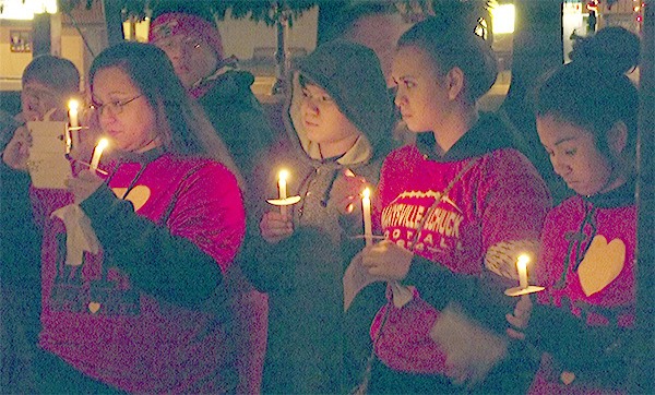 About three dozen people participated in The Marysville Candlelight Remembrance Dec. 22. Many were there to remember the victims of the Marysville-Pilchuck High School shooting two months ago.