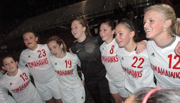 Members of M-P’s girls soccer team prior to their Oct. 22 match against Oak Harbor.
