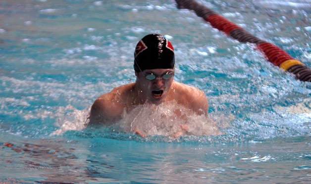 Connor Hemming on his way to placing eighth in the 100-yard breaststroke. Hemming