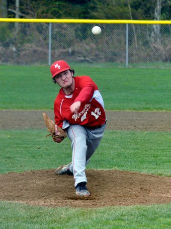 Tomahawks pitcher Jake Johnson strikes out an Eagles batter during their 18-0 victory in Arlington on April 18.