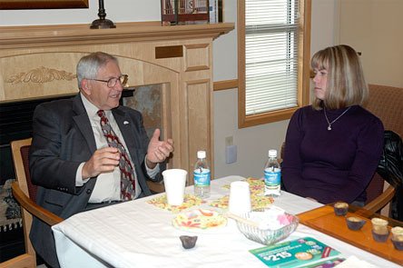 Marysville Mayor Dennis Kendall shares his thoughts on the city with Marci Miller and other residents March 24.