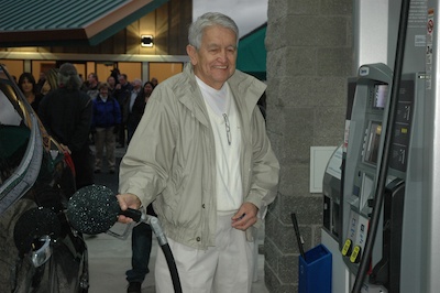Tulalip Tribal Treasurer Chuck James pumps the inaugural tankful of gas from the pumps of the Marine Drive Chevron fueling station on Nov. 3.