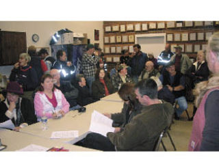 Nearly 50 people gathered at the Oso Firehall Nov. 23 to discuss the future of the old school house. At the end of the meeting community members agreed to gather signatures on a petition to take control of the old building which was left to the community for a community center. The deadline for collecting signatures is Dec.6