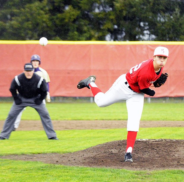 Marysville-Pilchuck's Nick Anderson delivers a pitch from the mound against Oak Harbor.