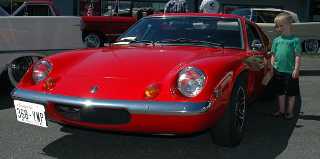 Marysville’s Ozzy Serge stood as high as Greg Termar’s 1969 Lotus Europa at last year’s car show to benefit the Susan G. Komen “3 Day for the Cure” breast cancer research fundraising walk.