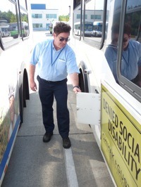 Marysville's Mike Majors conducts the standard pre-trip check that Community Transit coach operators perform every time they take a bus out of the yard.