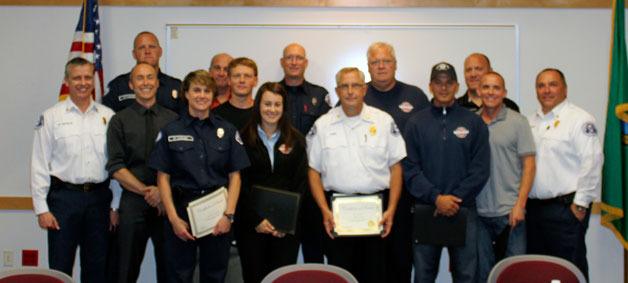 The honorees for their years of service at the Marysville Fire District Board of Directors’ Sept. 18 meeting. Back row from left