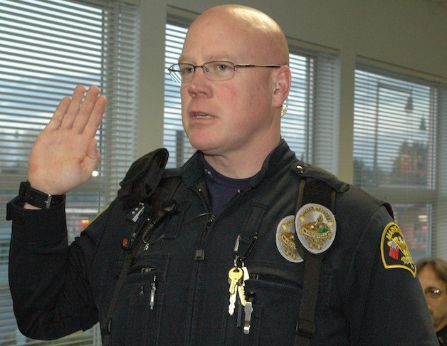 Kelly Pitts is sworn in as a Marysville Police officer on March 17.