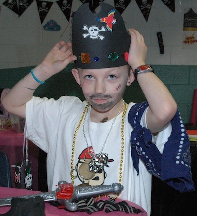 Elijah Melum dons his swashbuckling attire for the 'Princess & Pirate Breakfast Bowl' at Strawberry Lanes on March 2.