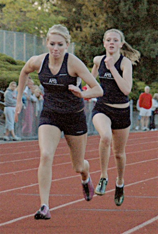 Arlington senior Erin Taylor takes off