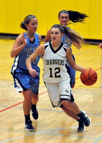 Marysville Getchell senior guard Alissa Belan drives past a Meadowdale defender on Jan. 21.