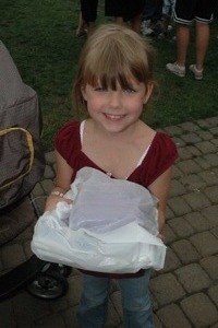 Marysville's Lorelai Adams was all smiles as she showed off her school supplies for kindergarten at last year's Summer Jubilee.