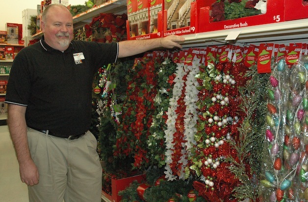 Marysville Big Lots Store Manager Dan Hanlon shows off the store’s seasonal stock