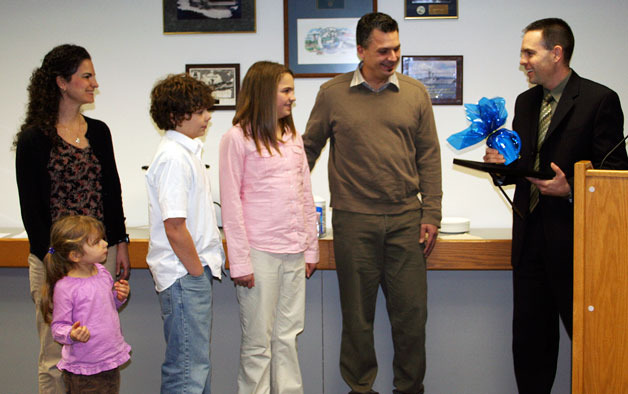 Mayor Jon Nehring presents the Van Horn family with their November City Volunteer of the Month framed certificate at the Dec. 13 City Council meeting. From left are Mayor Nehring and Vicki