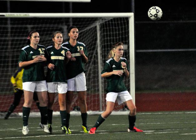 Four Getchell players make a wall to block a Mountlake Terrace free kick.