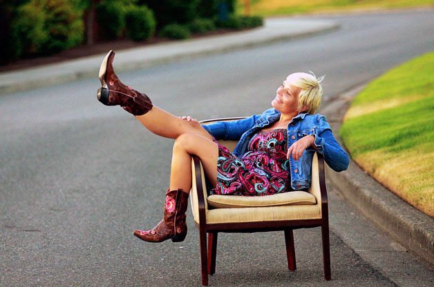 Jen Uhler poses after her battle with breast cancer. She is currently cancer-free.