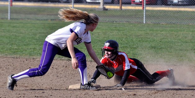 Megan Rollings steals second base as part of a two-run third inning for the Tommies.