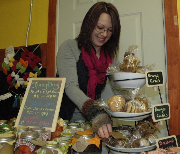 Loops Dujour's Christina Smith artfully arranges her tasty treats at Dues Produce Barn's 'Spring Fling' on March 15.